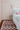 Wool area rug 2'3" X 8 - styled in a bedroom