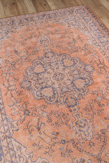 Orange area rug 8'5" X 12 - close-up of pattern and texture