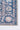 Blue area rug 2' X 3' - overhead flat lay view