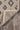 Beige Southwestern area rug 5' X 7' - corner detail and border