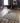 Beige area rug 3' X 5' - styled in a dining room
