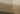 Beige Geometric area rug 2'3" X 8 - styled in a bedroom