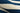 Navy area rug 1'8" X 3 - styled in a bedroom