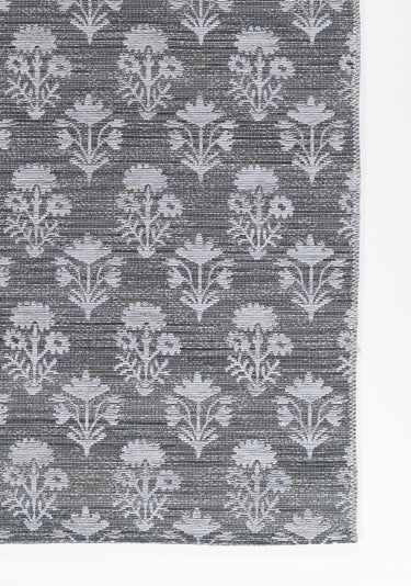 Beige area rug 7'10" X 10 - close-up of pattern and texture