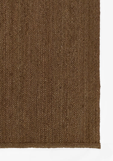 Brown area rug 2'6" X 8 - close-up of pattern and texture