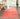Red area rug 9'6" X 12 - styled in a dining room