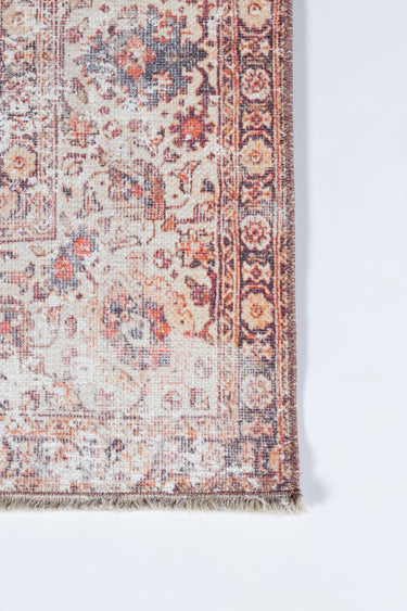 Red Polyester area rug 2' X 3' - close-up of pattern and texture
