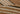 Brown area rug 10 10' X 14 - styled in a bedroom