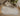 Ivory Contemporary area rug 6' X 9' - styled in a dining room