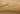 Beige Contemporary area rug 10' X 14' - styled in a bedroom