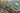 Blue area rug 9'6" X 13 - styled in a bedroom