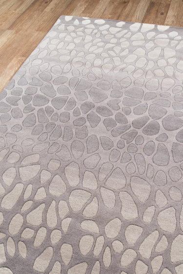 Tan area rug 33 8' X 10 - close-up of pattern and texture