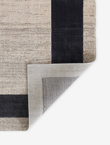 Black Contemporary area rug 7'9" X 9 - close-up of pattern and texture