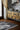 Black Polyester area rug 1'10" X 2 - styled in a living room