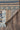 Brown area rug 30 2' X 3 - corner detail and border