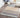 Brown Wool area rug 5' X 7' - styled in a dining room