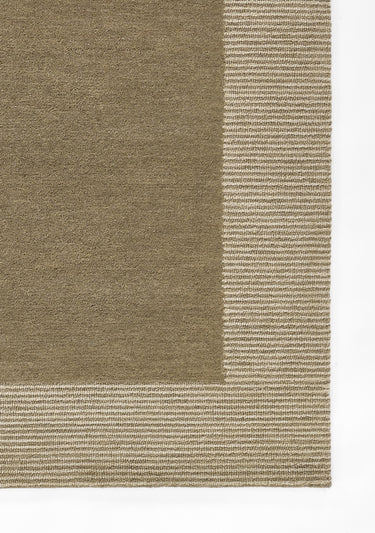 Beige area rug 5' X 8' - close-up of pattern and texture