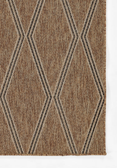 Tan area rug 6'6" X 9 - close-up of pattern and texture