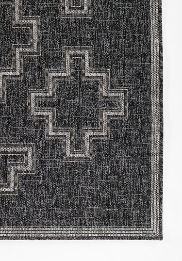 Black area rug 4'1" X 6 - close-up of pattern and texture