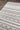 Ivory Geometric area rug 7'9" X 9 - close-up of pattern and texture