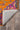 Orange area rug 2 3' X 5 - corner detail and border