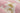 Pink Southwestern area rug 3' X 5' - styled in a bedroom