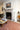 Orange area rug 8' X 10' - overhead flat lay view