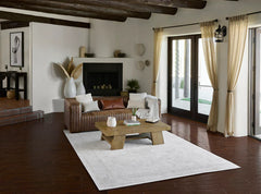 Low-pile woven ISA Collection rug with medallion design