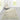 Ivory Polyester area rug 2'3" X 8 - styled in a dining room