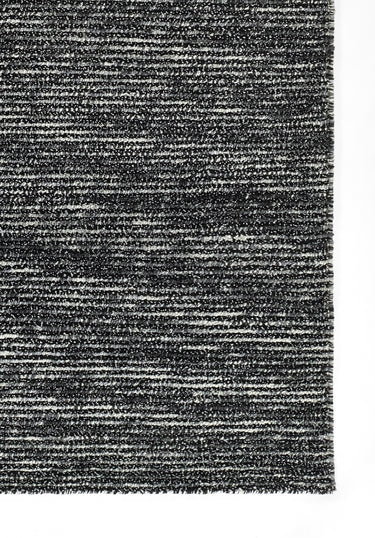 Black area rug 5' X 8' - close-up of pattern and texture