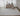 Ivory Contemporary area rug 3'9" X 5 - styled in a dining room
