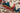 Ivory Oriental area rug 5' X 7' - styled in a bedroom