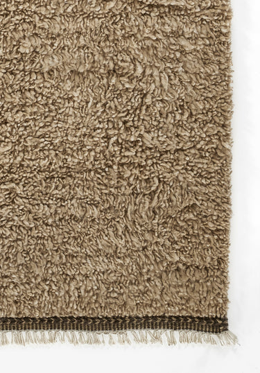 Tan Polyester area rug 9' X 12' - close-up of pattern and texture