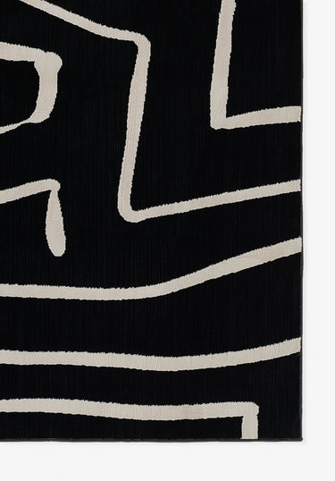 Black Polyester area rug 2' X 3' - close-up of pattern and texture