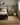 Green Wool area rug 9' X 12' - styled in a living room