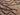 Brown Contemporary area rug 5' X 8' - styled in a living room