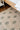 Natural Contemporary area rug 8' X 10' - styled in a bedroom
