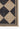 Black Wool area rug 9' X 12' - close-up of pattern and texture