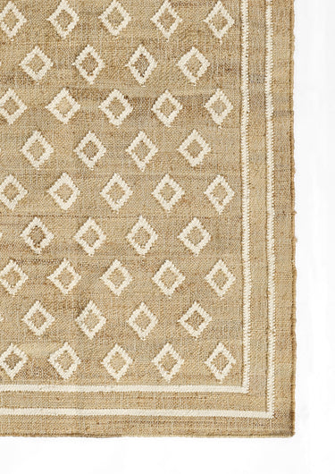 Tan Wool area rug 5' X 8' - close-up of pattern and texture