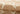 Tan area rug 6 3'6 - styled in a bedroom
