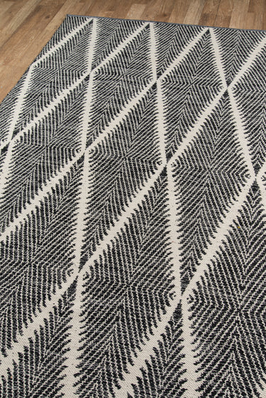 Black area rug 8'6" X 11 - close-up of pattern and texture