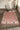 Pink Southwestern area rug 2' X 3' - styled in a dining room