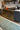 Green area rug 26 2'6 - styled in a dining room