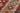 Red area rug 9'6" X 13 - styled in a bedroom