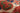 Red area rug 9'6" X 13 - styled in a bedroom