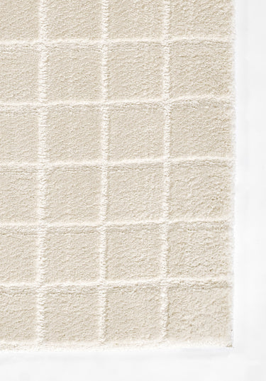 Ivory Polyester area rug 6'7" X 9 - close-up of pattern and texture