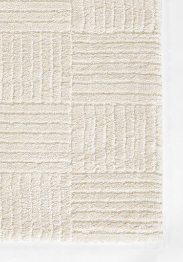 Ivory Polyester area rug 7'10" X 10 - close-up of pattern and texture
