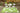 Green Polypropylene area rug 8' X 10' - corner detail and border
