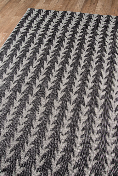 Black Contemporary area rug 6'7" X 9 - close-up of pattern and texture