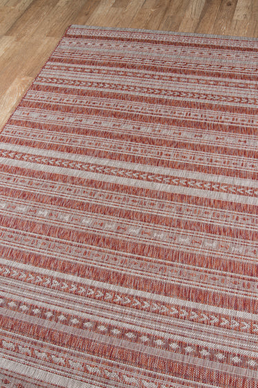Orange Polypropylene area rug 5'3" X 7 - close-up of pattern and texture
